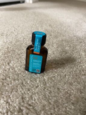 M THE Original MOROCCAN OIL Treatment For All Hair 0.5FL.OZ/ 15ml bottle.